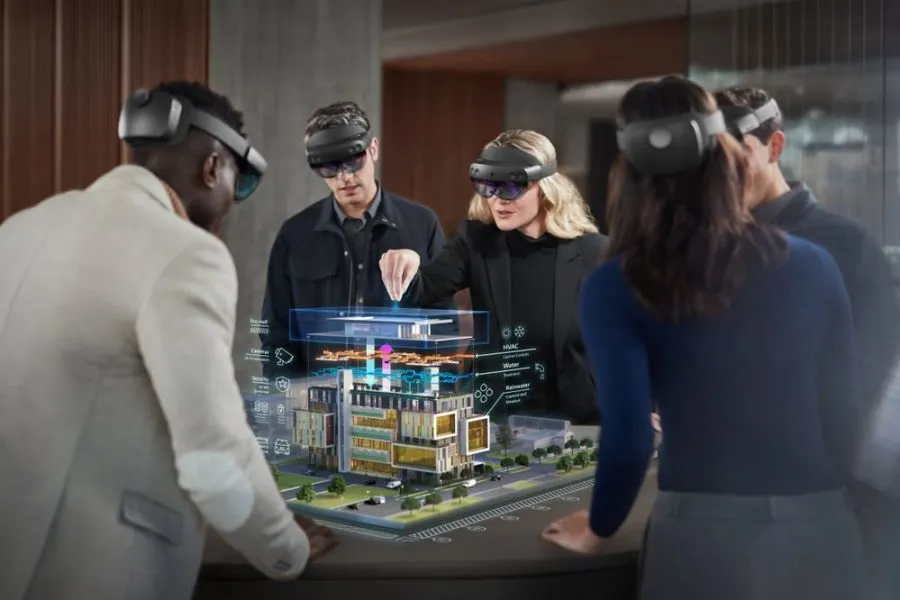 team collaborating on hologram with hololens 2